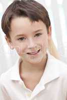 Headshot Portrait Of A Happy Smiling Young Boy