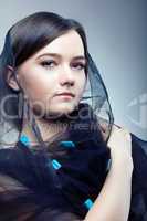 Young woman in pretty veil