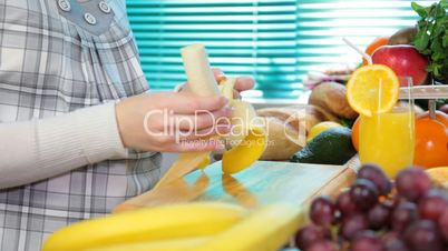 Pregnant woman sliced banana
