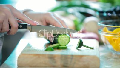 Chopping cucumber
