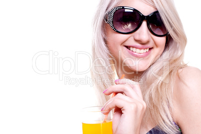 beautiful women in swimsuit with a glass of juice