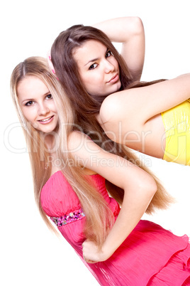 two beautiful women in a colored dress