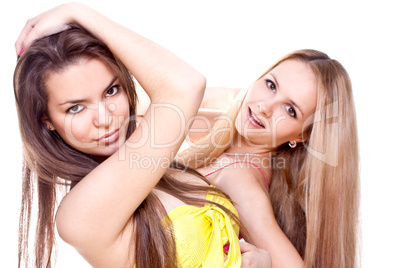 two beautiful women in a colored dress