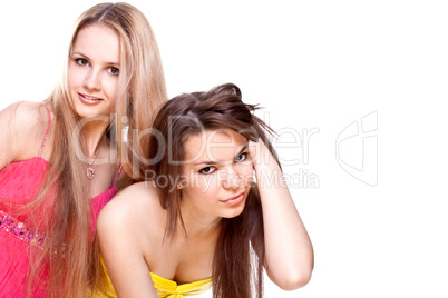 two beautiful women in a colored dress