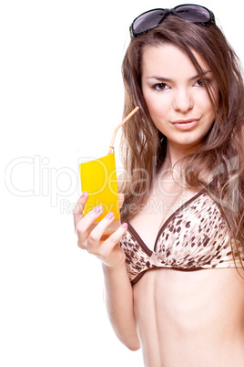 beautiful women in swimsuit with a glass of juice