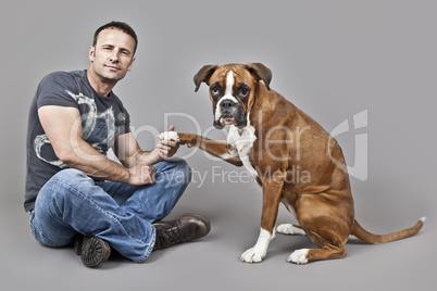 handsome muscle man with his dog