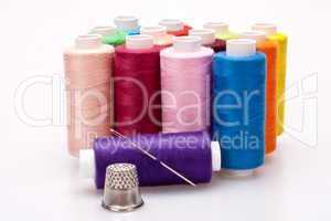 colored thread for sewing with needle and thimble