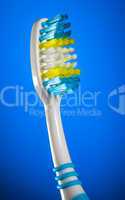 toothbrush on a dark blue background