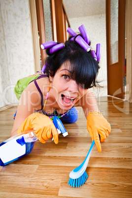 housewife washes a floor