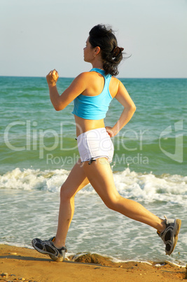 girl runs along the sea...