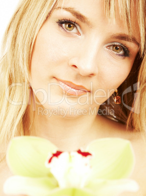 Portrait of the girl with an orchid