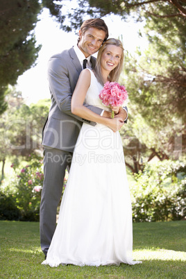 Portrait Of Bridal Couple Outdoors