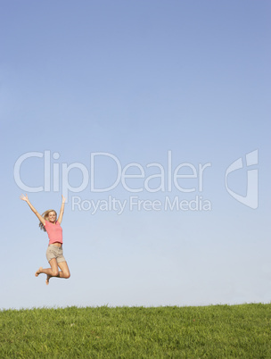 Young woman  jumping in air