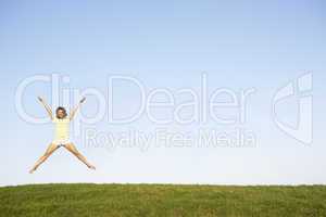 Young woman  jumping in air