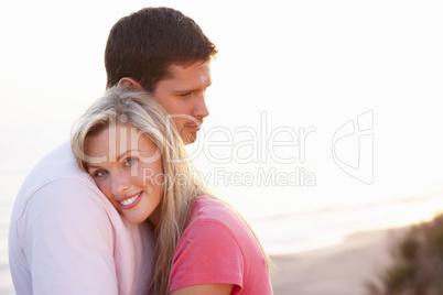 Romantic Young couple in love at sunset