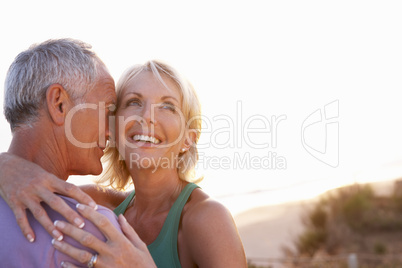 Romantic Senior Couple in love at sunset