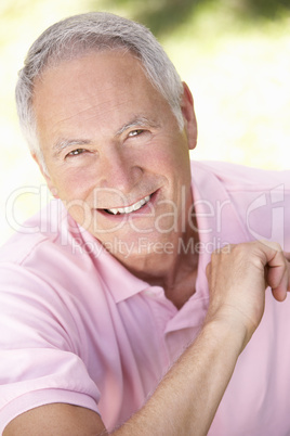 Senior man relaxing in a park