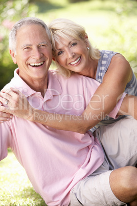 Senior couple relaxing together in park