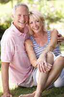 Senior couple relaxing together in park