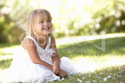 Young girl posing in park