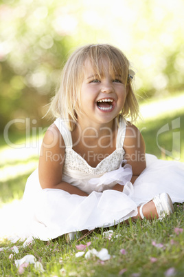 Young girl posing in park