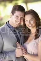 Smartly Dressed Young couple in park