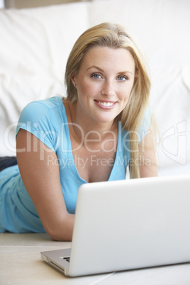 Young woman on her laptop computer