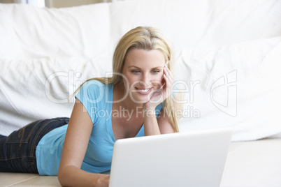 Young woman on her laptop computer