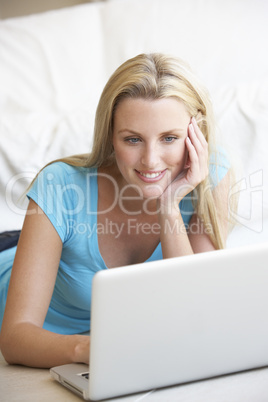 Young woman on her laptop computer