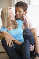 Young couple posing indoors