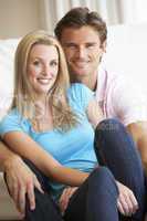 Young couple posing indoors