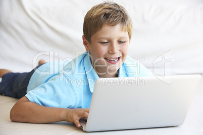 Young boy on his laptop computer