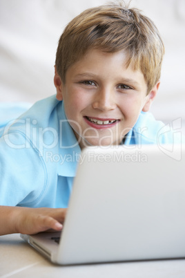 Young boy on his laptop computer