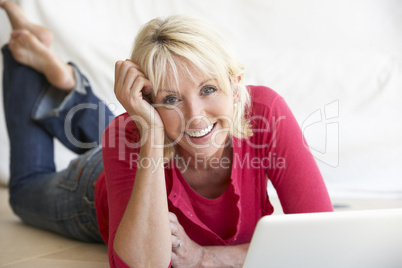 Middle age woman on her laptop computer