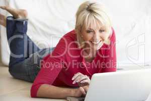 Middle age woman on her laptop computer