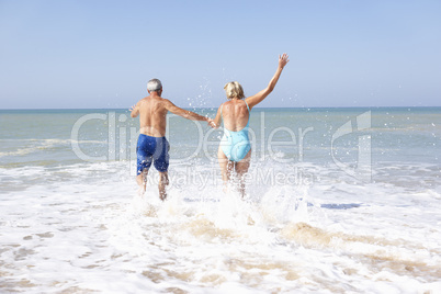 Senior couple on beach holiday