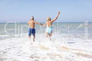 Senior couple on beach holiday