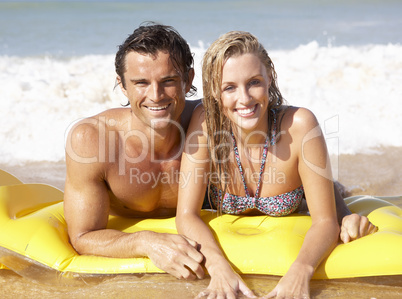 Young couple on beach holiday