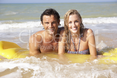 Young couple on beach holiday