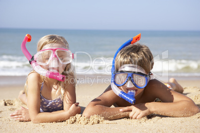 Young children on beach holiday