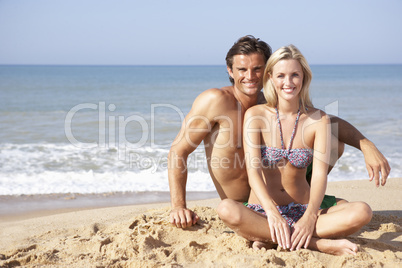 Young couple on beach holiday