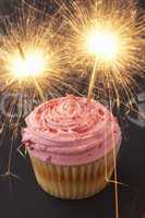 A cupcake with sparklers