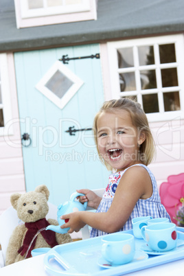 A young girl plays outdoors