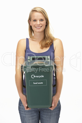 Young woman holding recycling container