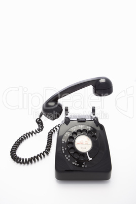 A rotary dial telephone