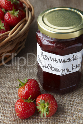 A still life of strawberry jam