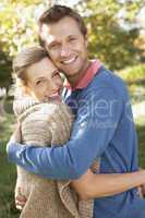 Young couple posing in park