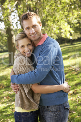 Young couple posing in park