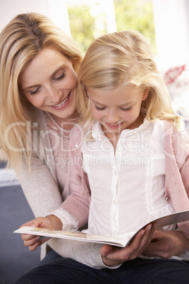 Woman and child reading together