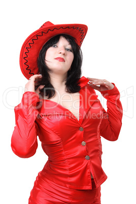 Portrait of a beautiful young woman in a red suit and hat